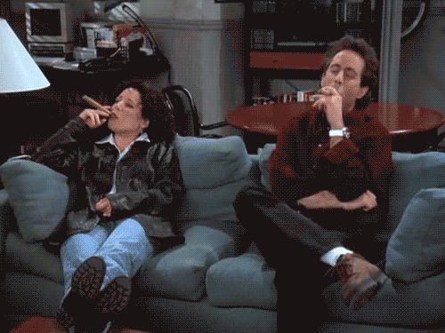  photo Elaine-Benes-and-Jerry-Seinfeld-Sitting-on-Couch-Smoking-Cigars_zps3965916c.gif