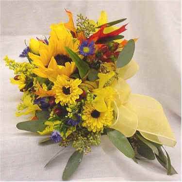 Re sunflowers and wheat bouquets an image